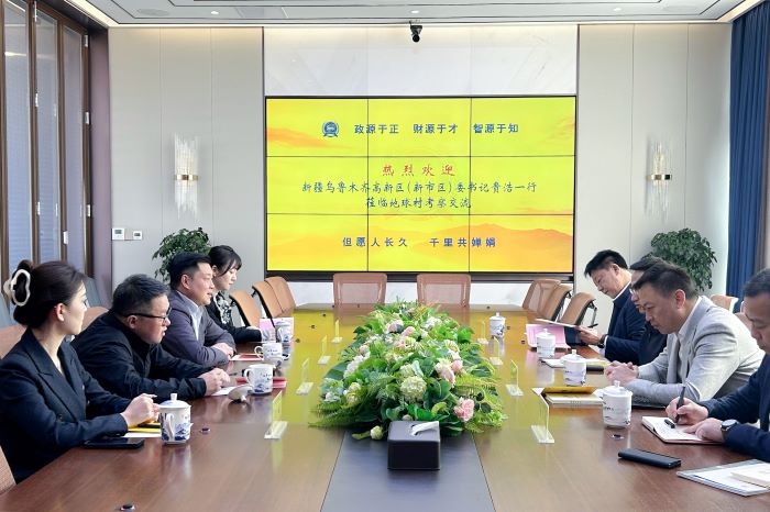 3月3日嚴(yán)昊同新疆烏魯木齊高新區(qū)（新市區(qū)）委書記貴浩.jpg